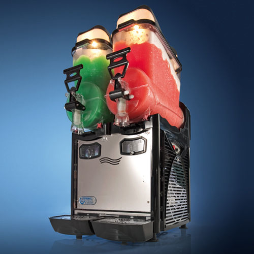 Twin frozen beverage dispenser
